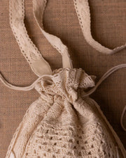 Dazzle drawstring crochet potli, handmade eco-friendly bag by The Mango House Trust